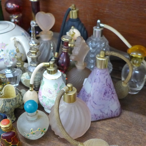 678 - A collection of approximately 40 perfume bottles and an Arthur Wood teapot **PLEASE NOTE THIS LOT IS... 