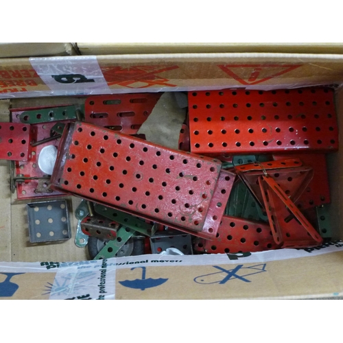 696 - A metal tool cabinet containing Meccano parts and three boxes of loose Meccano