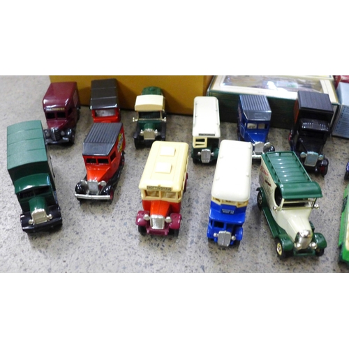 702 - A collection of die cast vehicles including Days Gone, Lledo, some boxed