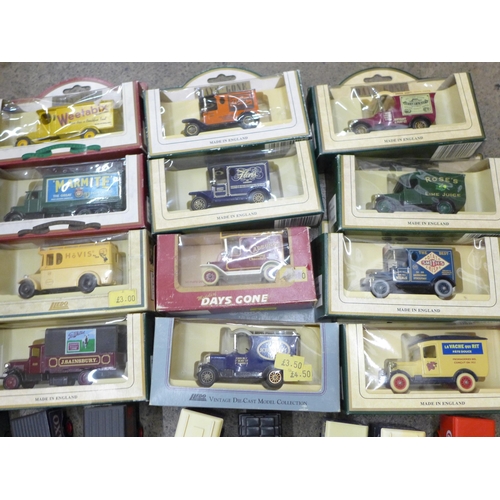 702 - A collection of die cast vehicles including Days Gone, Lledo, some boxed