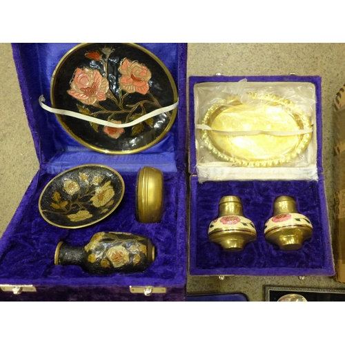 706 - A collection of souvenir spoons, two boxed sets of silver plated spoons, an enamelled cruet set and ... 