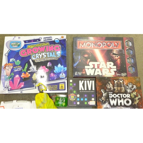 714 - A collection of children's board games and other games, Doctor Who, Star Wars, Monopoly, Throw Throw... 