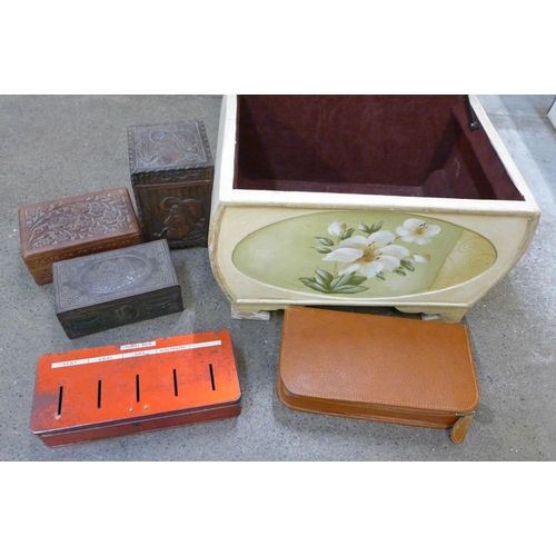 715 - Three carved wooden boxes, a tin, a cased Two-Tix shaving kit and a box decorated with flowers