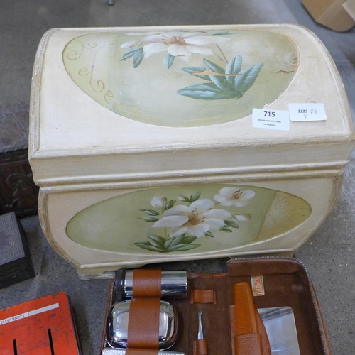 715 - Three carved wooden boxes, a tin, a cased Two-Tix shaving kit and a box decorated with flowers