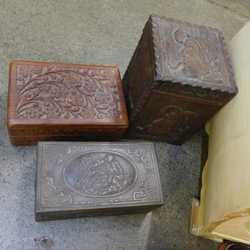 715 - Three carved wooden boxes, a tin, a cased Two-Tix shaving kit and a box decorated with flowers