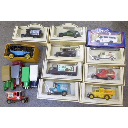 718 - Eight Days Gone model vehicles, boxed, a Tetley Lledo promotional car, Corgi Classics model and five... 