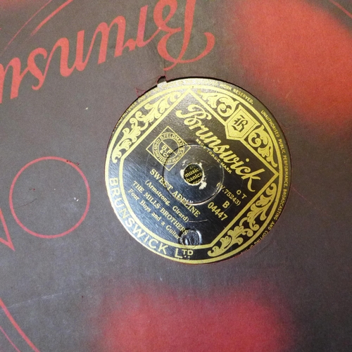 719 - A collection of twenty-three 78rpm records by the 'Mills Brothers' on the Brunswick label