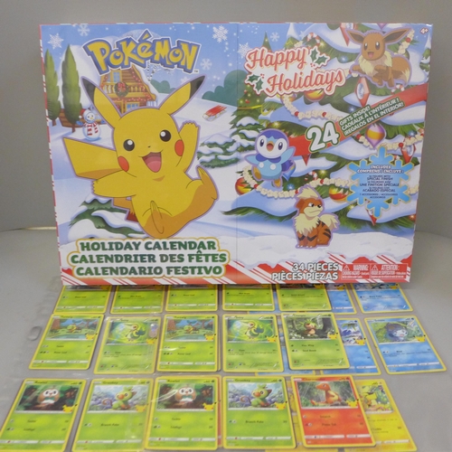 720 - A Pokemon Advent Calendar and complete Pokemon McDonalds set