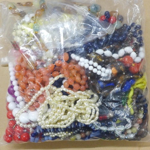 723 - A collection of vintage necklaces, lucite, glass beads etc.