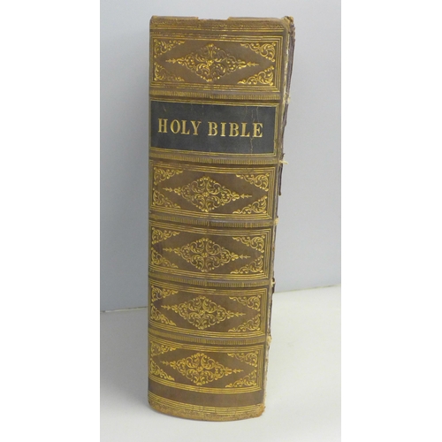 734 - An 1812 family Bible with photograph, spine cover for repair