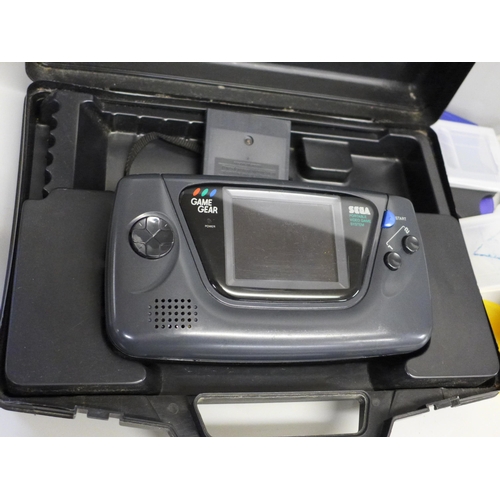 735 - Vintage Sega game gear console with carry case and Super Nintendo joystick