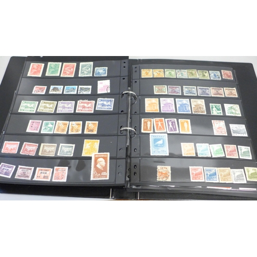 740 - Two albums of stamps; one album of mainly mint GB stamps and the other including early China, Chile,... 