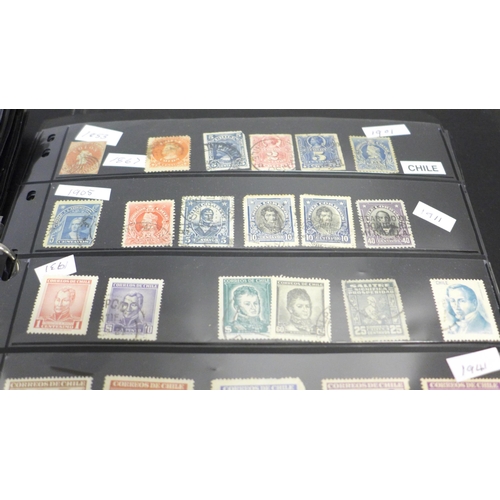 740 - Two albums of stamps; one album of mainly mint GB stamps and the other including early China, Chile,... 