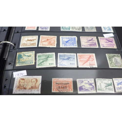 740 - Two albums of stamps; one album of mainly mint GB stamps and the other including early China, Chile,... 