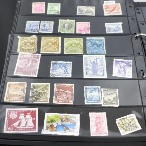 740 - Two albums of stamps; one album of mainly mint GB stamps and the other including early China, Chile,... 