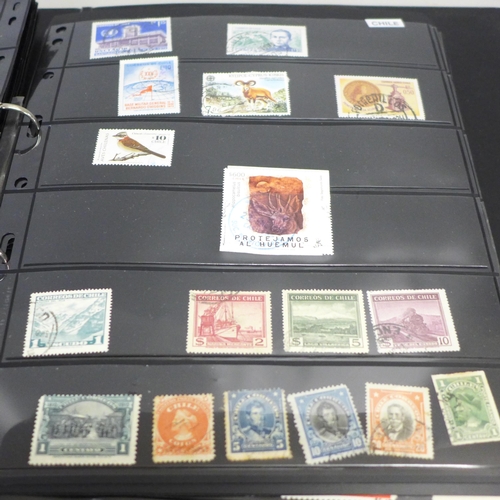 740 - Two albums of stamps; one album of mainly mint GB stamps and the other including early China, Chile,... 