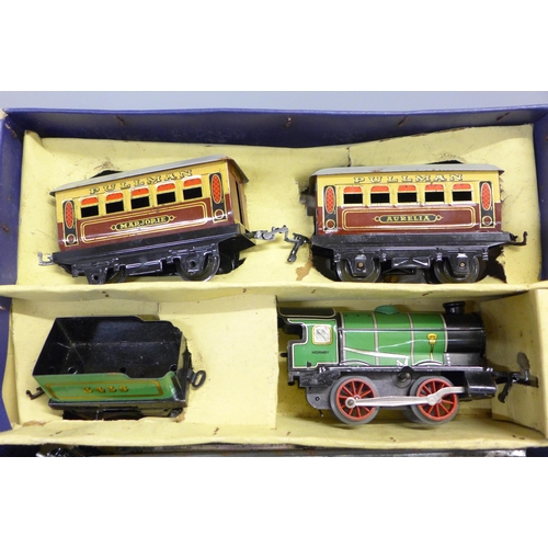 752 - A Hornby O gauge M1 passenger train set, No 2 single arm signal and No 20 wagon