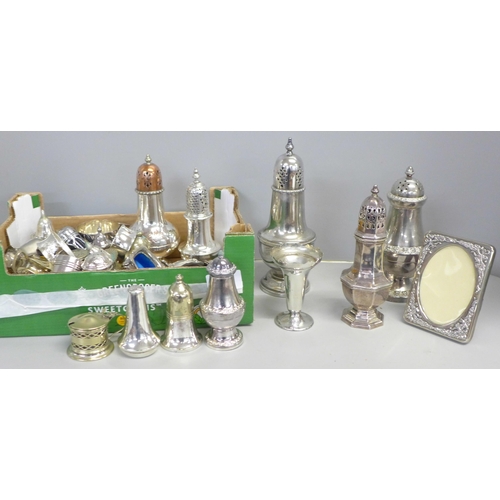 753 - Mixed silver plate including three sugar shakers, salts, mug and other condiments