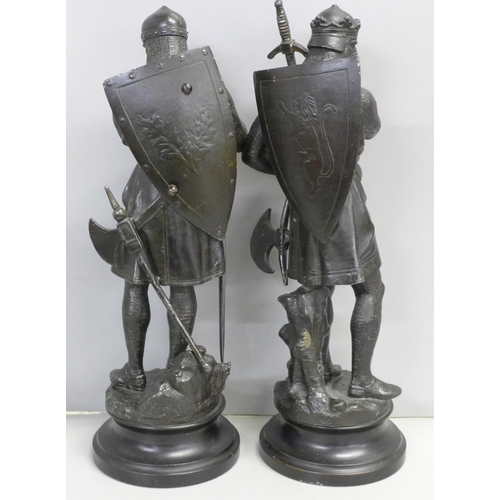 755 - A pair of spelter figures of Richard I, holding an axe and holding a long sword, with mail armour, 3... 