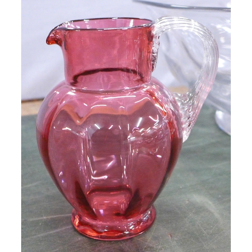 757 - A large crystal punch bowl, 38cm diameter, a heavy cased cranberry art glass vase, two pieces of cra... 