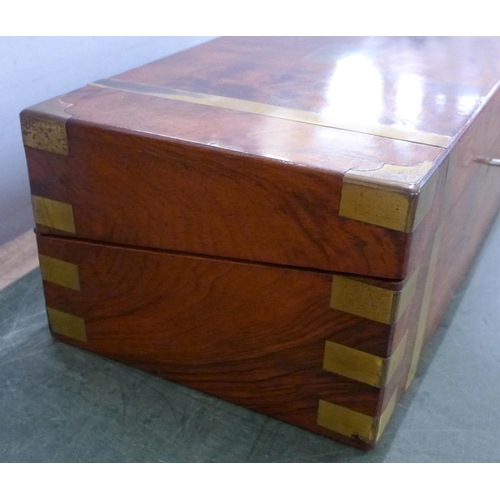 758 - A 19th Century brass bound and burr walnut writing slope with a pair of ink bottles