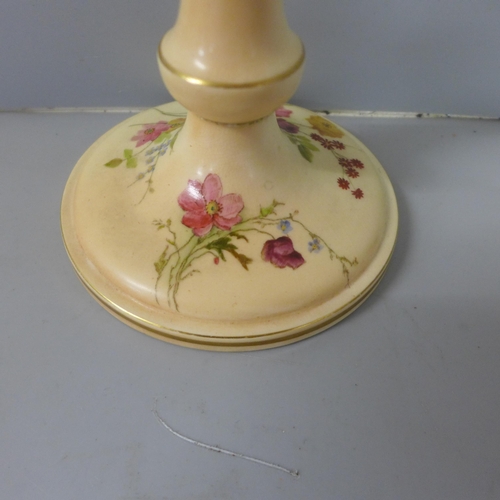 766 - A Royal Worcester dressing table set, blush ivory with floral detail including a pair of candlestick... 