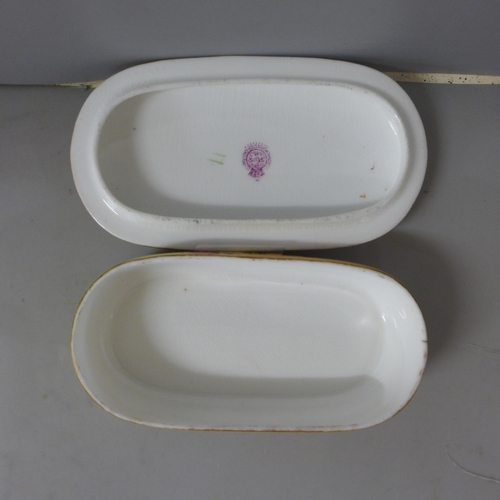 766 - A Royal Worcester dressing table set, blush ivory with floral detail including a pair of candlestick... 