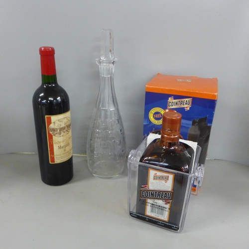 769 - A bottle of Cloitre des Dames Margaux 2001 750ml red wine, a packaged box and ice bucket of Cointrea... 