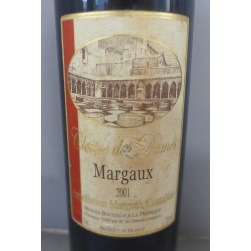 769 - A bottle of Cloitre des Dames Margaux 2001 750ml red wine, a packaged box and ice bucket of Cointrea... 