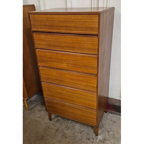 51 - A teak chest of drawers