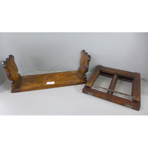 778 - A walnut ecclesiastical design book slide and a wooden book rest