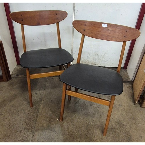 57 - A pair of Danish Farstrup 28402 model teak side chairs