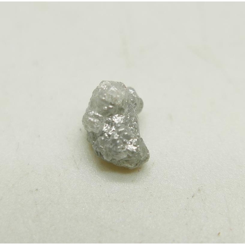 978 - A rough/uncut diamond, weight 2.02 cts