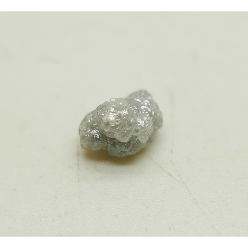 978 - A rough/uncut diamond, weight 2.02 cts