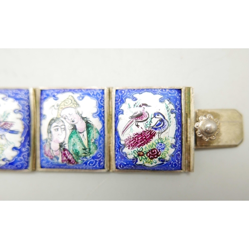 981 - An enamel panel bracelet with hand painted decoration, 19cm