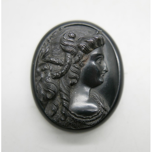 983 - A carved jet cameo portrait brooch, 5.5cm x 4.4cm, 27g