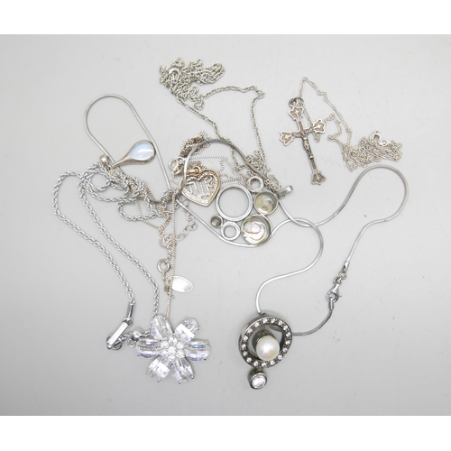 995 - Five silver pendants with chains, some set with stones, and a Swarovski silver plated chain and flow... 