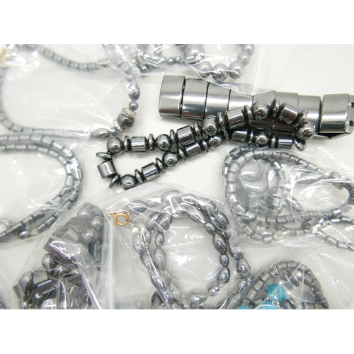 997 - A collection of hematite jewellery - five bracelets, five necklaces and one short string of beads