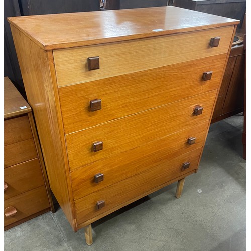 37 - A teak chest of drawers