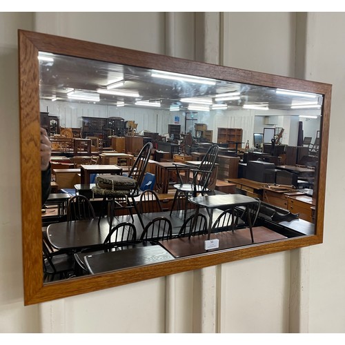 50 - A teak framed mirror