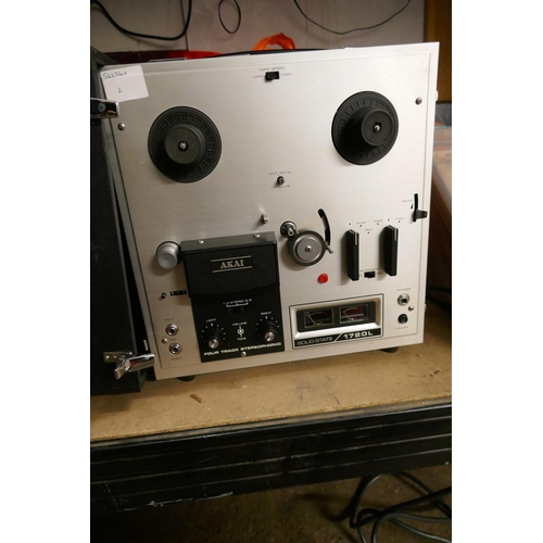 2103 - An Akai 1720L solid state reel to reel with reels, microphone, etc.