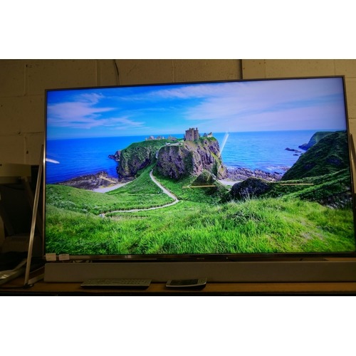 2113 - A Panasonic Smart 50” 4K UHD TV (TX-50DX802B) with sound bar and 2 remote controls