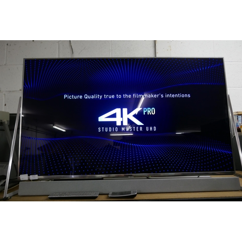 2113 - A Panasonic Smart 50” 4K UHD TV (TX-50DX802B) with sound bar and 2 remote controls