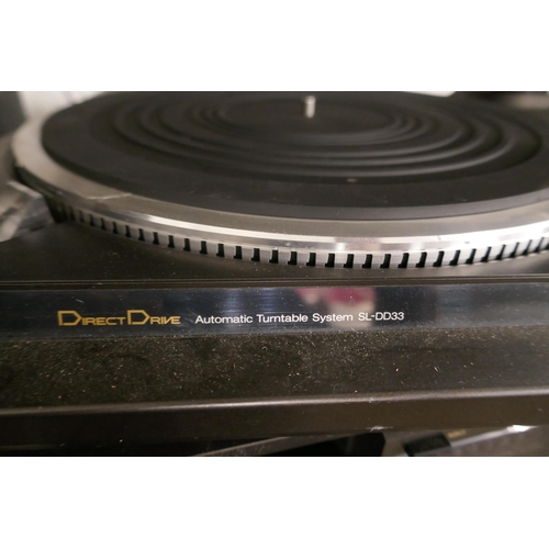 2119 - A quantity of Technics stereo equipment including an SL-DD33 direct drive automatic turntable system... 