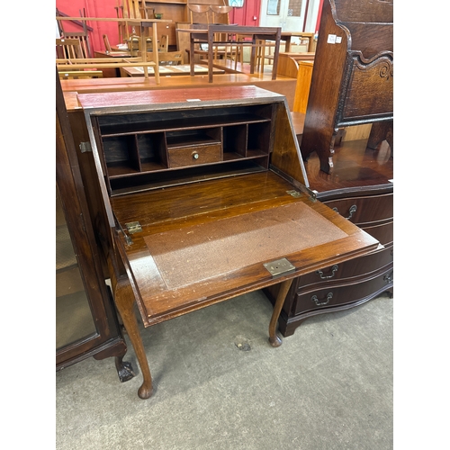 195 - A Queen Anne style mahogany and burr walnut bureau de dame