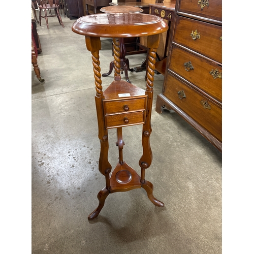 200 - A George III style mahogany wig stand