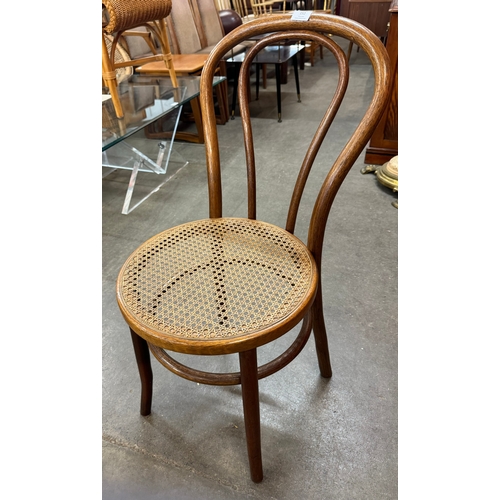 152 - A set of four beech bentwood chairs