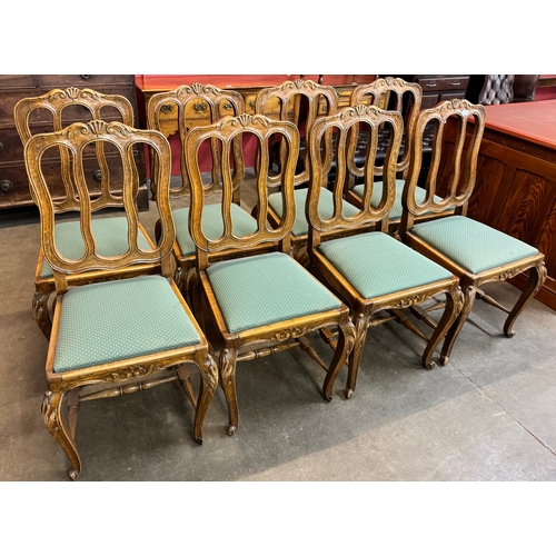 158 - A set of eight French carved oak dining chairs