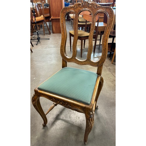 158 - A set of eight French carved oak dining chairs