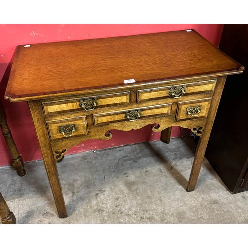 160 - A George II style Ipswich oak lowboy